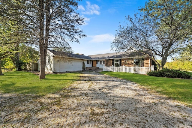 1940 W Eagle Lake Rd, Beecher, IL 60401 - ranch-style house with a garage, a front lawn, dirt driveway, and fence