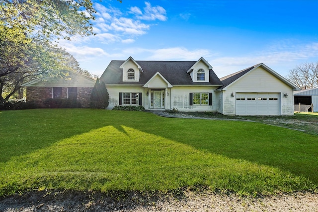 view of front of property featuring a garage and a front lawn