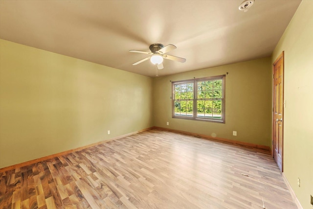 1940 W Eagle Lake Rd, Beecher, IL 60401 - unfurnished room with a ceiling fan, baseboards, and light wood-style flooring
