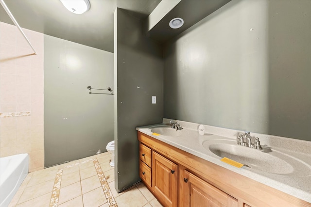 bathroom with tile patterned flooring, tile walls, toilet, and vanity