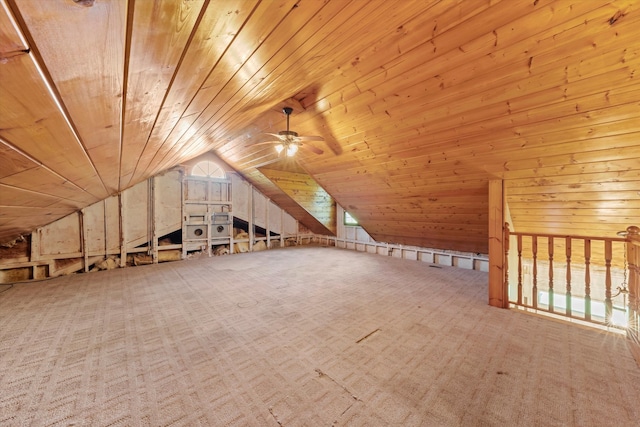 bonus room featuring lofted ceiling, wood ceiling, and carpet