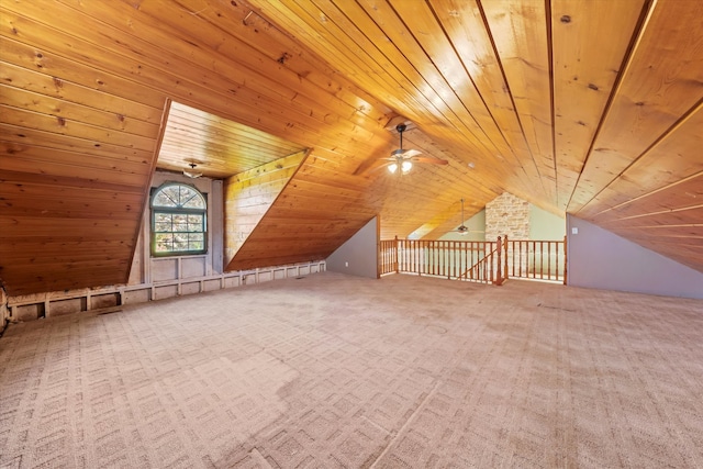 additional living space featuring ceiling fan, carpet floors, wood ceiling, and lofted ceiling