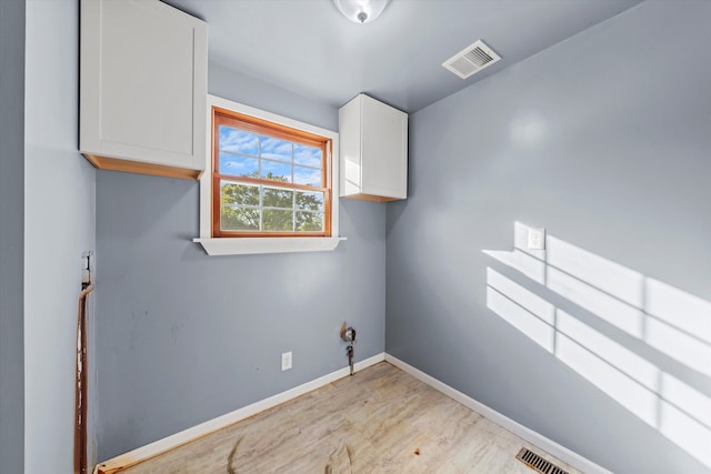 washroom featuring light hardwood / wood-style flooring