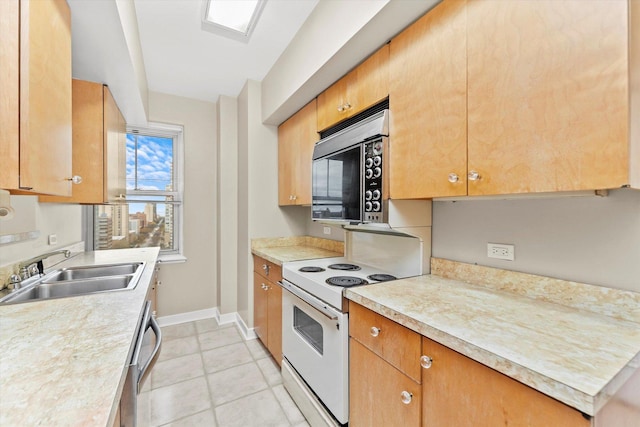 kitchen featuring stainless steel dishwasher, white electric range oven, light tile patterned floors, and sink