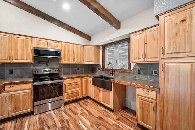 kitchen featuring decorative backsplash, sink, light hardwood / wood-style floors, lofted ceiling with beams, and stainless steel appliances