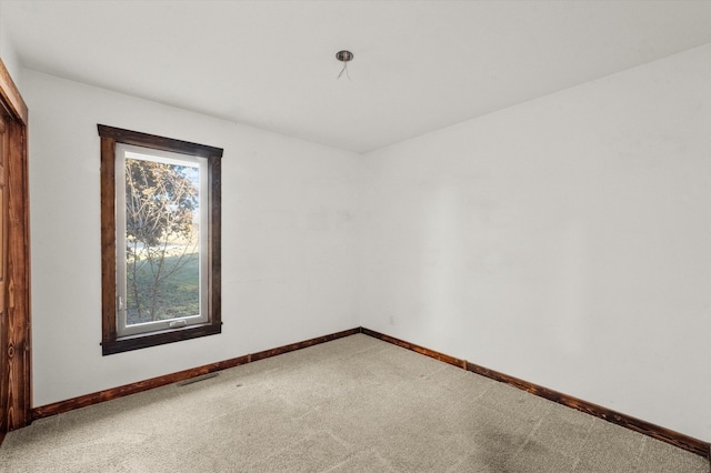 view of carpeted spare room