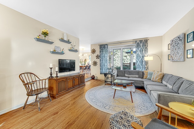 living room with light hardwood / wood-style floors