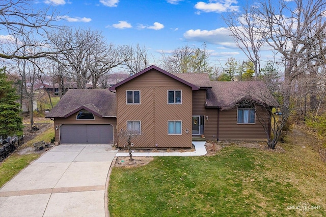 view of property with a garage and a front lawn