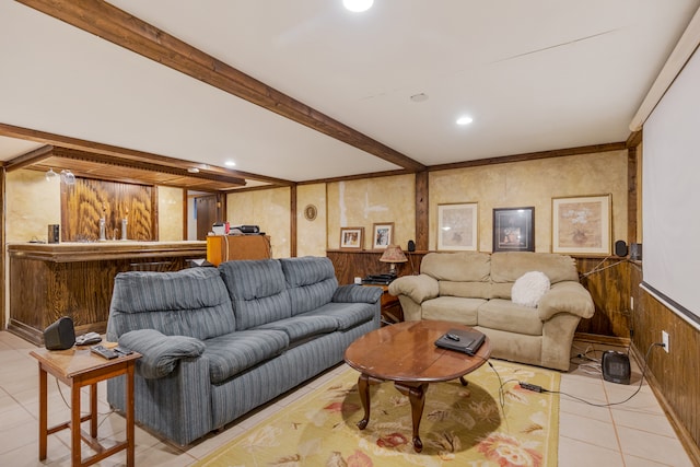 tiled living room with wood walls and beamed ceiling