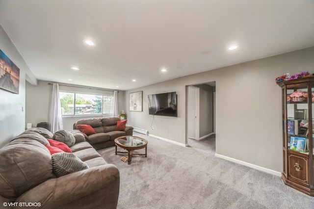 living room with light colored carpet and a baseboard radiator