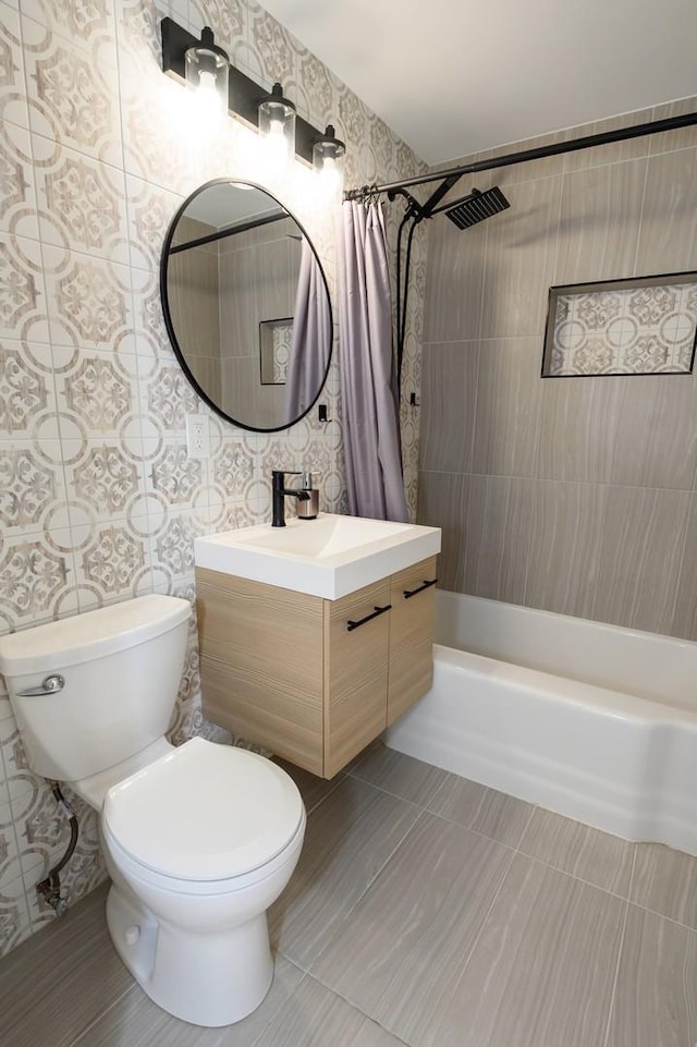 full bathroom featuring tile patterned flooring, vanity, shower / bathtub combination with curtain, and toilet