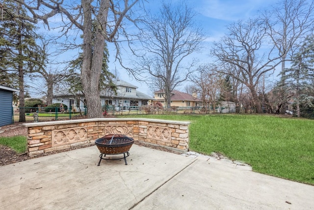 view of patio with a fire pit