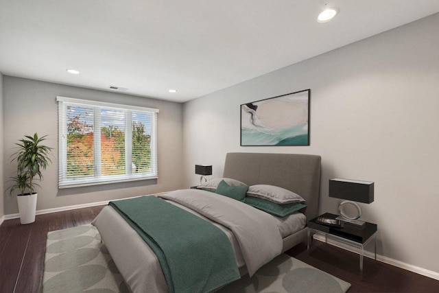 bedroom featuring dark hardwood / wood-style floors