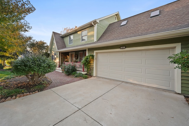 view of front of home featuring a garage and covered porch