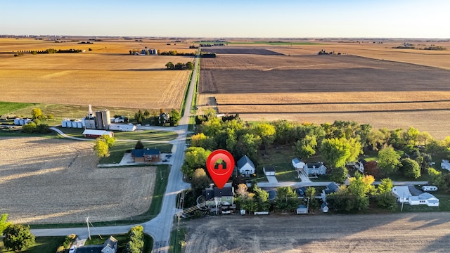 birds eye view of property featuring a rural view