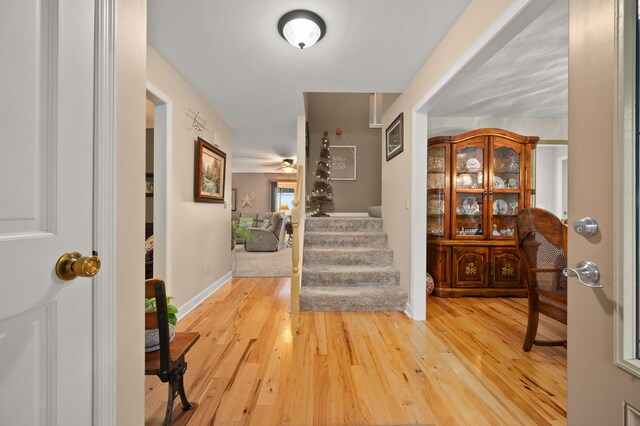 5995 W Clare Rd, Clare, IL 60111 - entryway featuring hardwood / wood-style flooring and stairway
