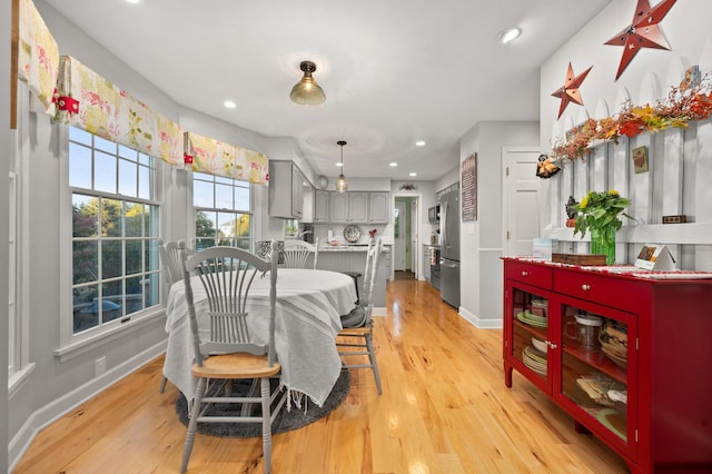 5995 W Clare Rd, Clare, IL 60111 - dining space featuring light wood-style floors and recessed lighting