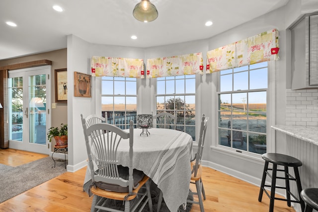 dining room with light wood-type flooring