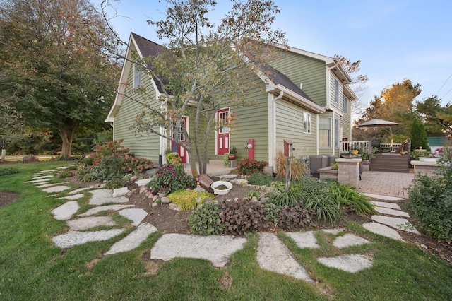 5995 W Clare Rd, Clare, IL 60111 - view of side of property featuring a deck and a lawn