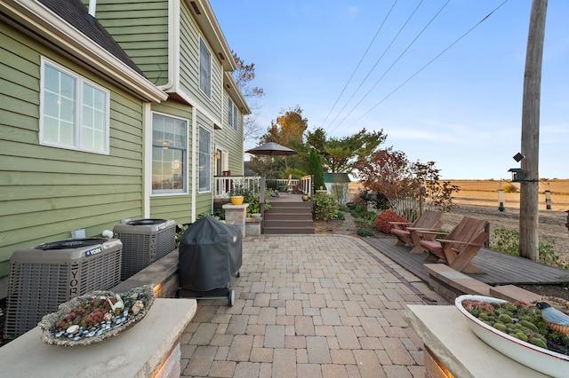 view of patio featuring central AC unit