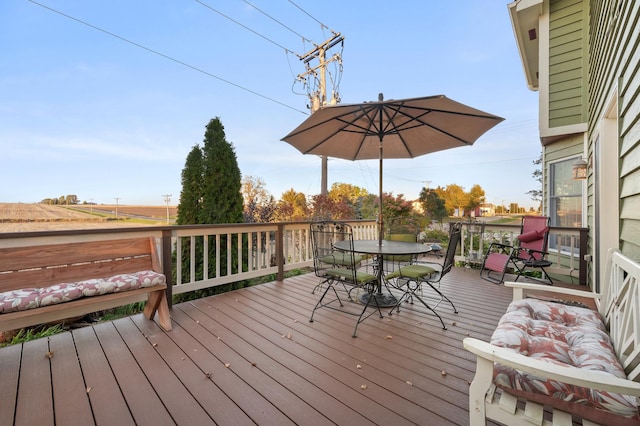 5995 W Clare Rd, Clare, IL 60111 - wooden terrace with outdoor dining space