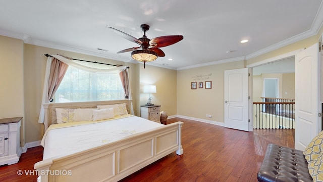 bedroom with ornamental molding, ceiling fan, and dark hardwood / wood-style flooring