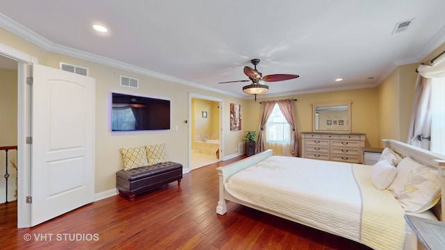 bedroom featuring ceiling fan, ornamental molding, dark hardwood / wood-style flooring, and ensuite bath