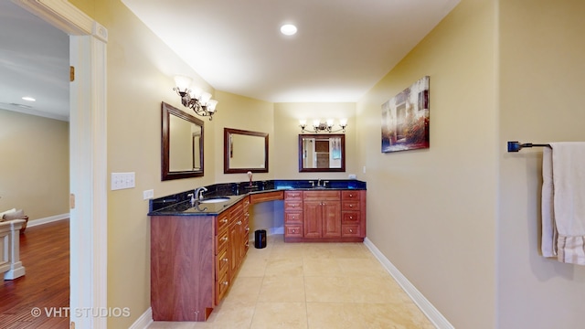 bathroom featuring vanity and hardwood / wood-style floors