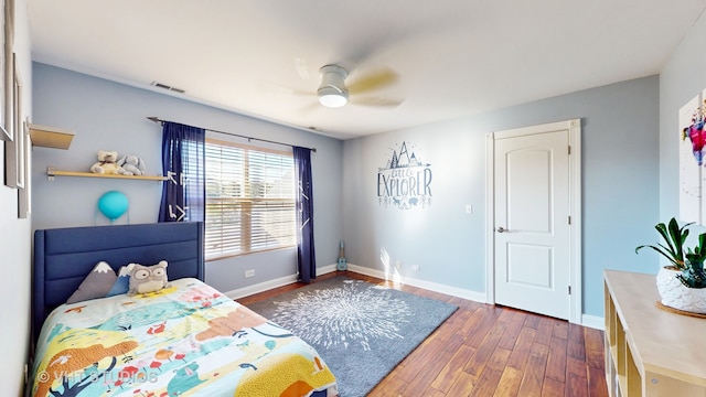 bedroom featuring ceiling fan and dark hardwood / wood-style flooring