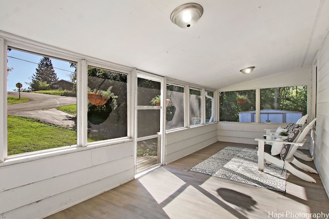 sunroom / solarium with vaulted ceiling and plenty of natural light