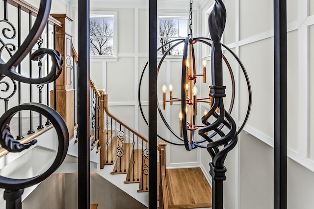 details featuring hardwood / wood-style flooring and a chandelier