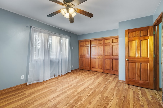 unfurnished bedroom featuring a closet, ceiling fan, and light hardwood / wood-style floors