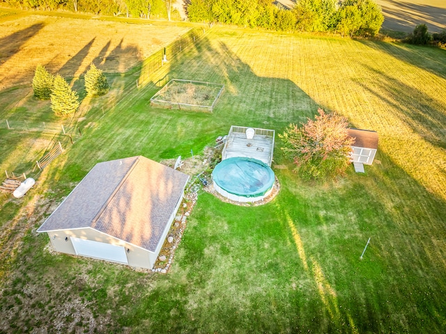 birds eye view of property featuring a rural view