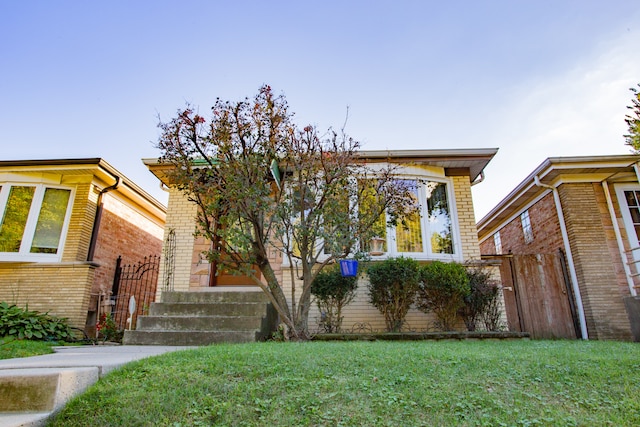 view of front of house with a front yard