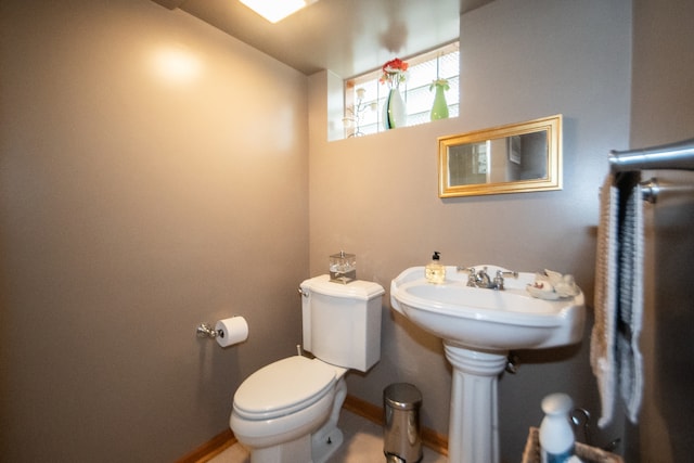 bathroom with sink and toilet