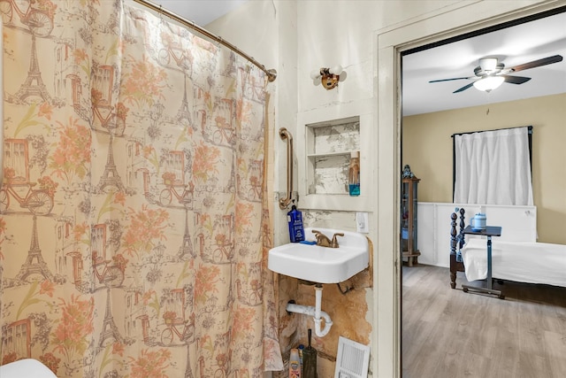 bathroom featuring sink, hardwood / wood-style floors, and ceiling fan