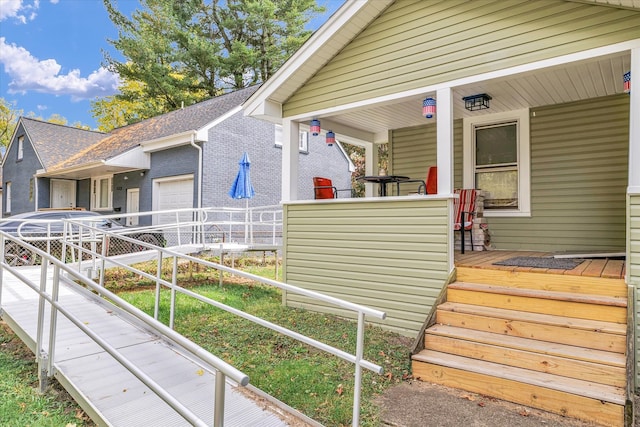 view of property exterior with covered porch