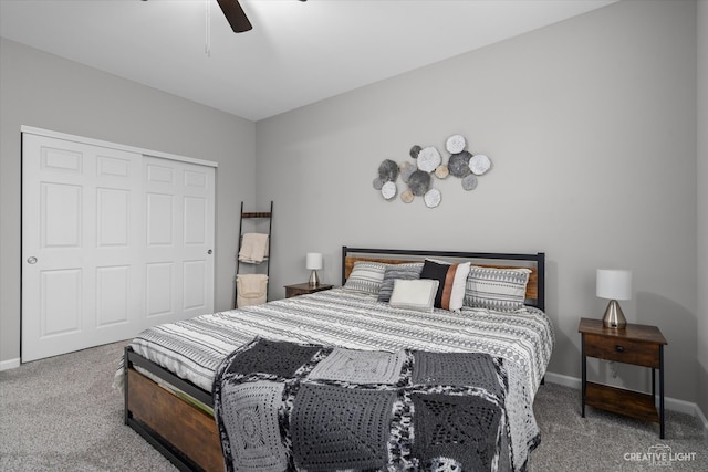 carpeted bedroom featuring a closet and ceiling fan