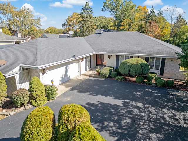 ranch-style home with a garage