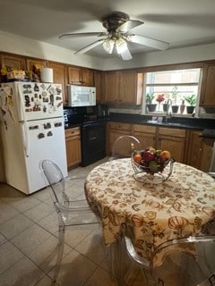 kitchen with white appliances, ceiling fan, sink, and light tile patterned flooring