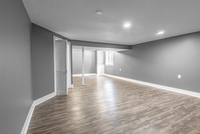 unfurnished room featuring wood-type flooring