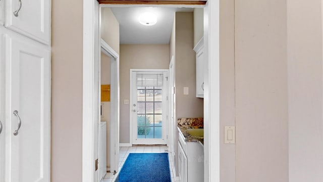 entryway featuring light tile patterned floors