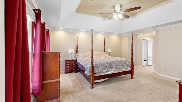 bedroom featuring carpet, baseboards, recessed lighting, ornamental molding, and a raised ceiling