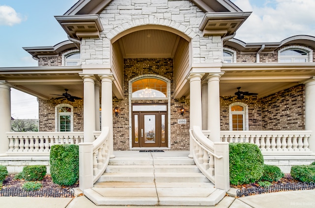 doorway to property featuring ceiling fan and a porch