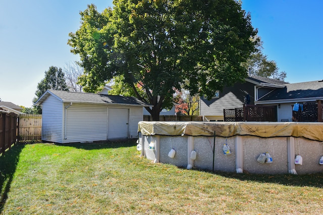 view of yard featuring a covered pool