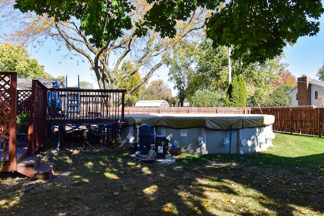 exterior space featuring a yard and a deck