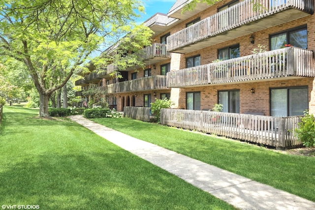 view of community with a lawn