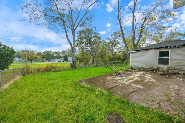 view of yard with a patio and fence