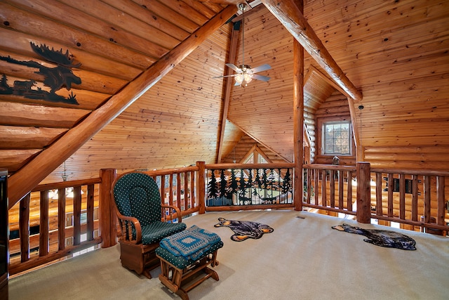 unfurnished room featuring wood ceiling, high vaulted ceiling, beam ceiling, and wooden walls