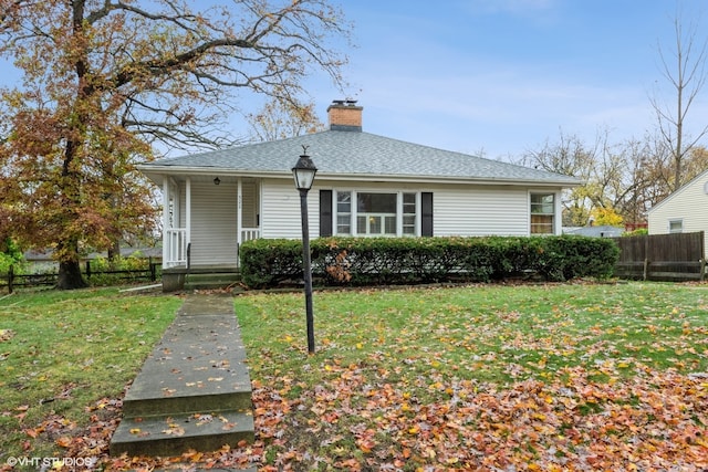 view of front of property with a front lawn